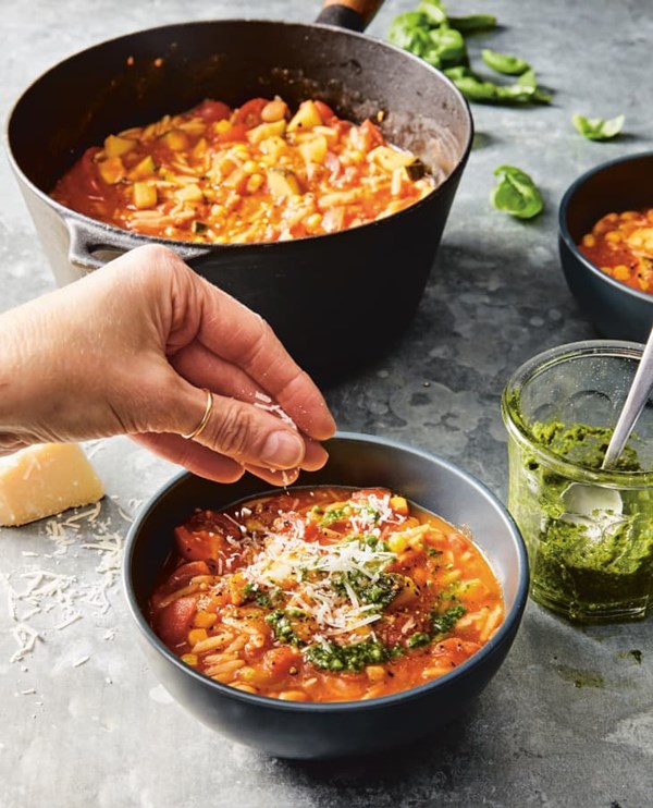 Orzo minestrone with fresh corn, zucchini, and pesto