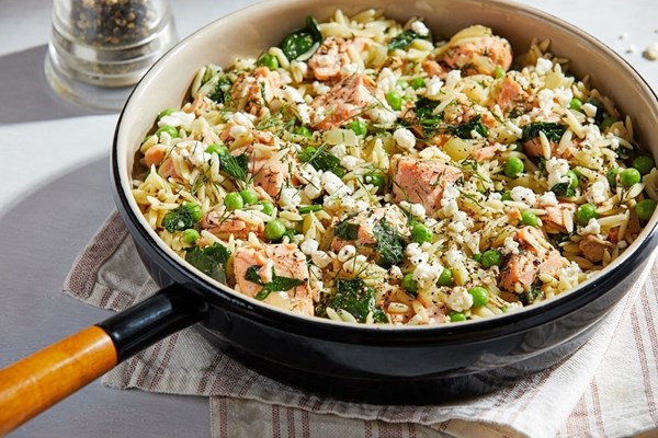Orzo skillet with salmon, peas, dill and feta