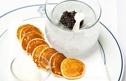 Ossetra caviar with blinis and sour cream