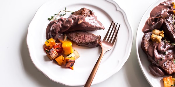Ostrich steak with wine and mushroom sauce