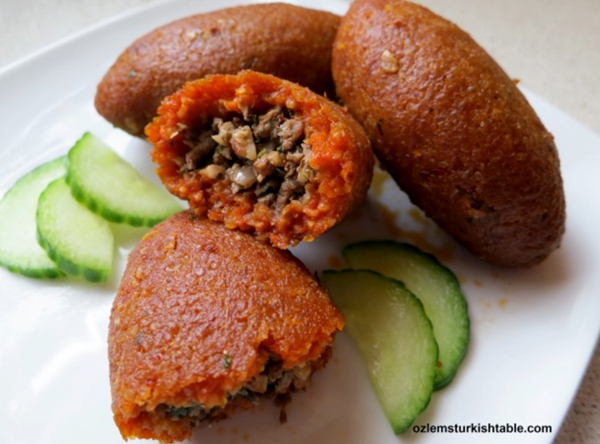 Oval bulgur balls with walnuts and minced/ground meat (Oruk)