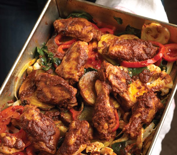 Oven-baked chicken with chard and red radishes