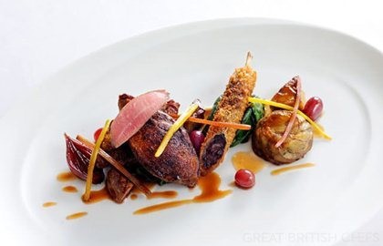 Oven roasted squab pigeon with braised crispy leg and foie gras Hollandaise