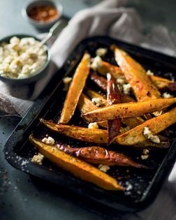 Oven-roasted sweet potatoes with a blue cheese dip