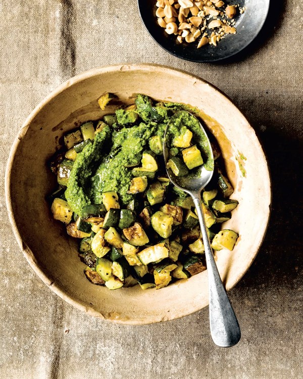 Oven-roasted zucchini with collard-peanut pesto and roasted peanuts