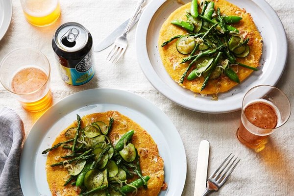 Oversized mozzarella arepas with spring vegetables