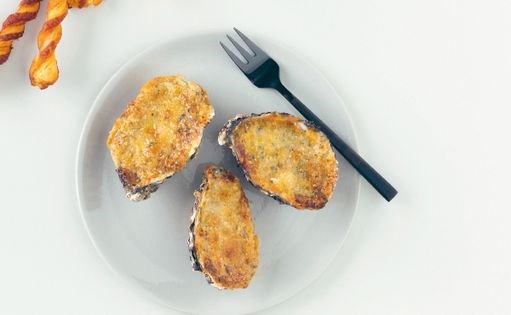 Oysters baked w/ horseradish + Parmesan