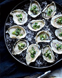 Oysters on the half shell with ceviche topping