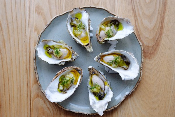 Oysters with dill, apple and fermented cucumber