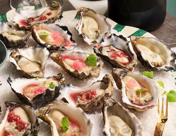 Oysters with lemon myrtle-citrus granita and pepperberry mignonette