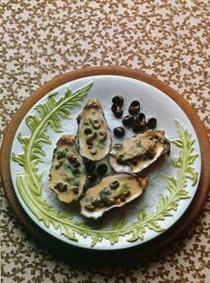 Oysters with periwinkles in butter sauce (Huîtres chaudes aux bigorneaux)