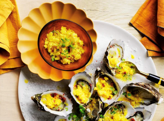 Oysters with pickled pineapple and pink peppercorn granita