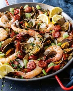 Paella with clams, shrimp, and chorizo