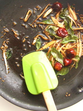 Pakistani-style white lentils with a sizzling oil garnish