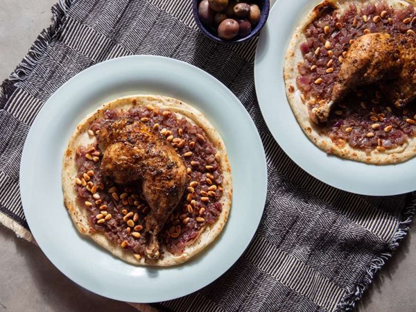 Palestinian flatbreads with onion, sumac, and spiced roast chicken (Msakhan)