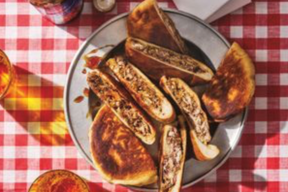 Palestinian sumac chicken and onion pitas (Arayes msakhan)