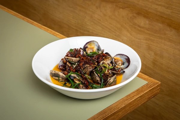 Palourde clams with Chiu Chow chilli oil and pancetta and chilli jam