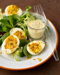 Pan-crisped deviled eggs on French lettuces
