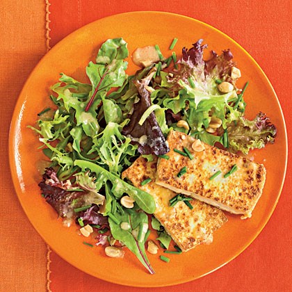 Pan-crisped tofu with greens and peanut dressing