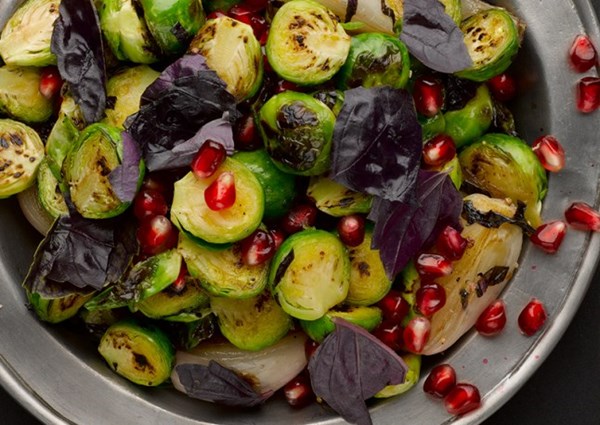 Pan-fried Brussels sprouts and shallots with pomegranate & purple basil