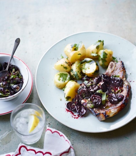 Pan-fried buttermilk veal chop with tangy cherry sauce and herby potatoes