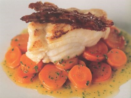 Pan-fried cod with carrots, parsley and over-cooked bacon