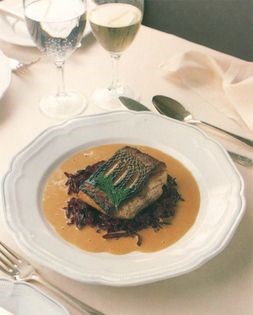 Pan-fried Cornish sea bass on a bed of caramelized red cabbage [Brian Turner]
