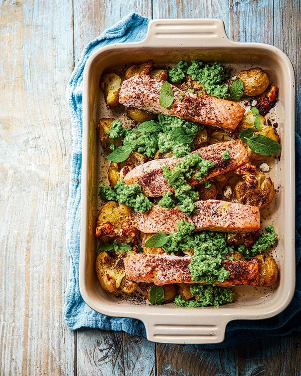 Pan-fried fish with pea guacamole and smashed new potatoes