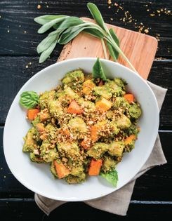 Pan-fried gnocchi & acorn squash with hazelnut-sage pesto