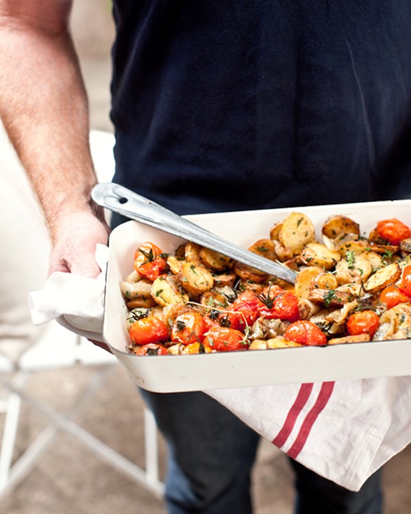 Pan-fried herby potatoes with sweet oven-roasted onions and cherry tomatoes