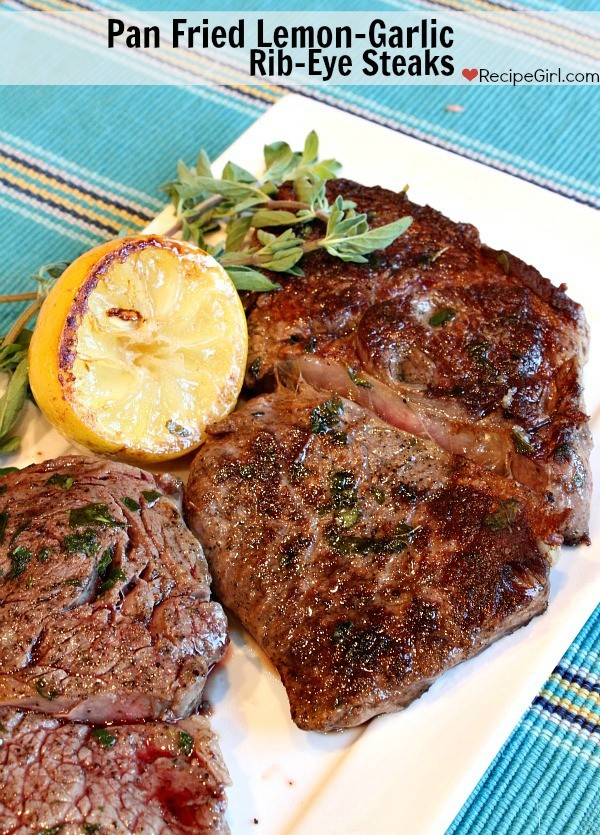 Pan-fried lemon-garlic rib eye steaks