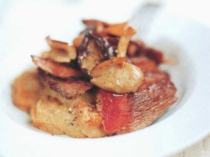 Pan-fried ostrich and wild mushrooms on pumpkin polenta