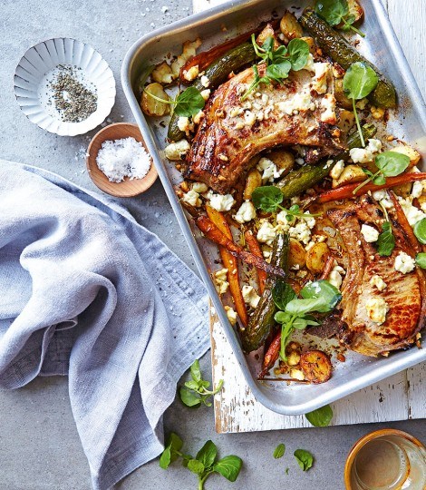 Pan-fried pork chops with roasted cumin baby veg, potatoes and feta