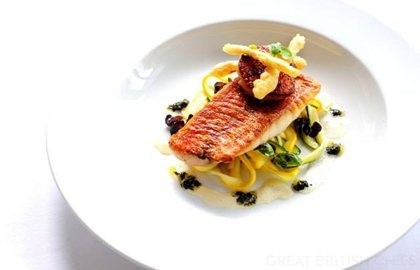 Pan-fried red mullet on courgette tagliatelle with scallops and purple basil pesto