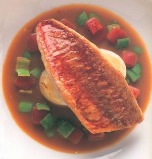 Pan-fried red mullet with a tomato and leek soup