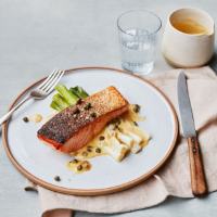 Pan-fried salmon with baby leeks and anchovy Hollandaise