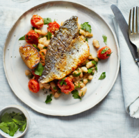 Pan-fried sea bream with cannellini beans and tomatoes