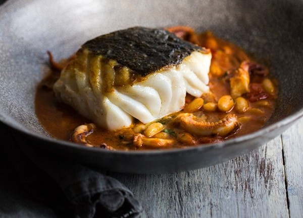 Pan-fried skrei with cannellini beans and squid