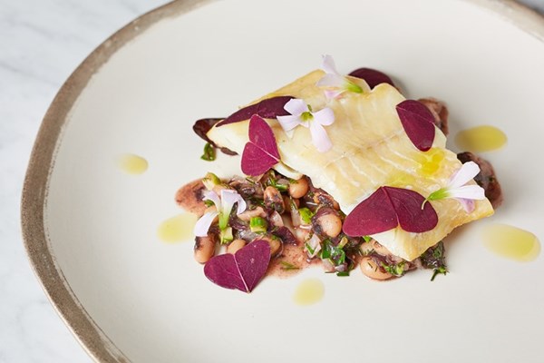  Pan-fried smoked haddock with black-eyed beans