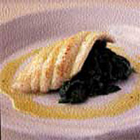 Pan-fried sole with spinach and an orange and cardamom dressing 