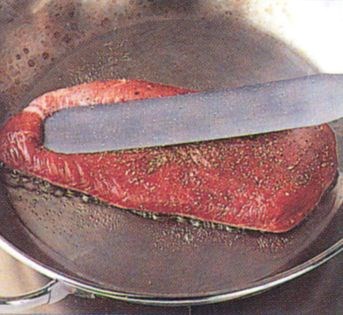 Pan-frying a breast of duck