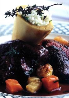 Pan-roast tail fillet of beef with braised shin, risotto of fresh horseradish, root vegetables and ale juices