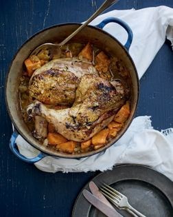 Pan-roasted chicken leg quarters with thyme, sweet potatoes, and pineapple