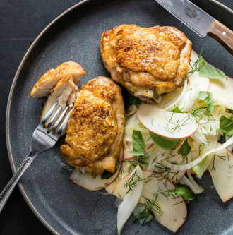 Pan-roasted chicken thighs with fennel-apple slaw