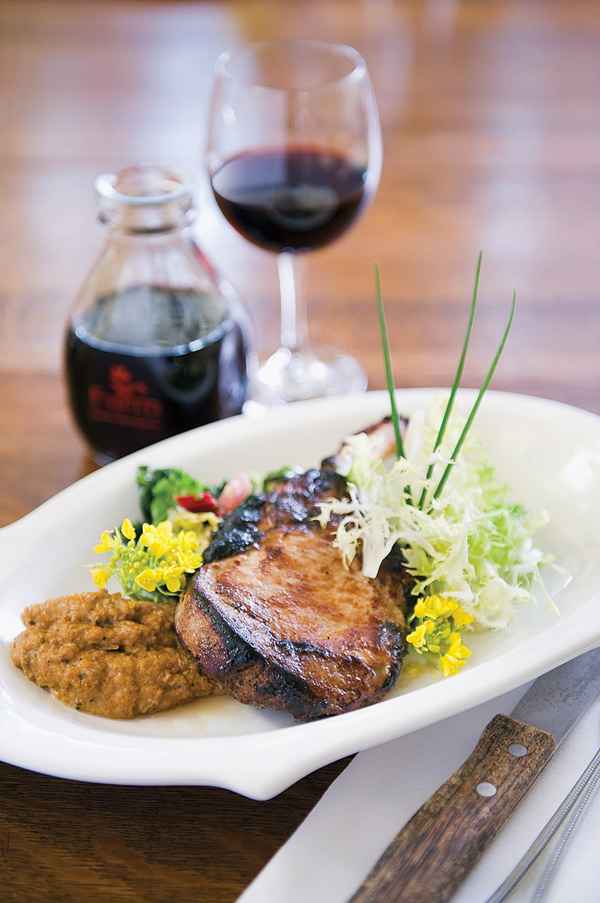 Pan-roasted Fiedler Farms pork chops with bourbon, locally foraged spice-bush berries & hoosier persimmons