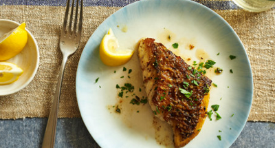Pan roasted fish fillets with herb butter 