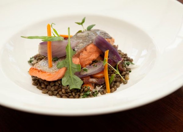 Pan-roasted fjord trout with lentils, crispy bacon and chervil