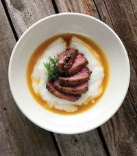 Pan-roasted goose breasts with orange and ouzo
