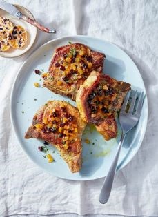 Pan-roasted pork chop with fruited compound butter