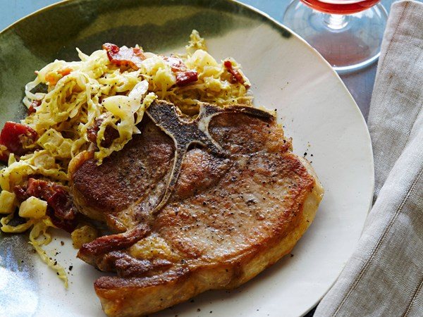 Pan-roasted pork chops with creamy cabbage and apples